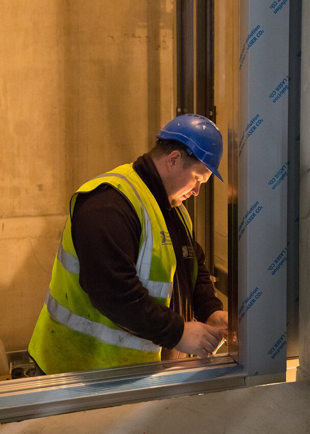 Lift Installation Lincoln Transport Hub for Willmott Dixon, Lift engineer fitting doors