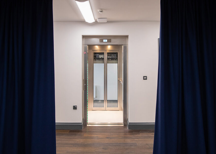 Glass Lift Installation Nottingham Trent University, University Hall, lift exit onto stage
