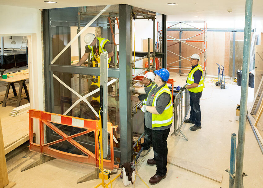 Glass Lift Installation Nottingham Trent University, University Hall, behind safety barriers
