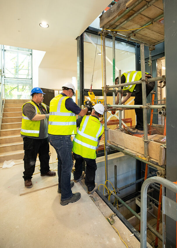 Glass Lift Installation Nottingham Trent University, University Hall, glass side panel install