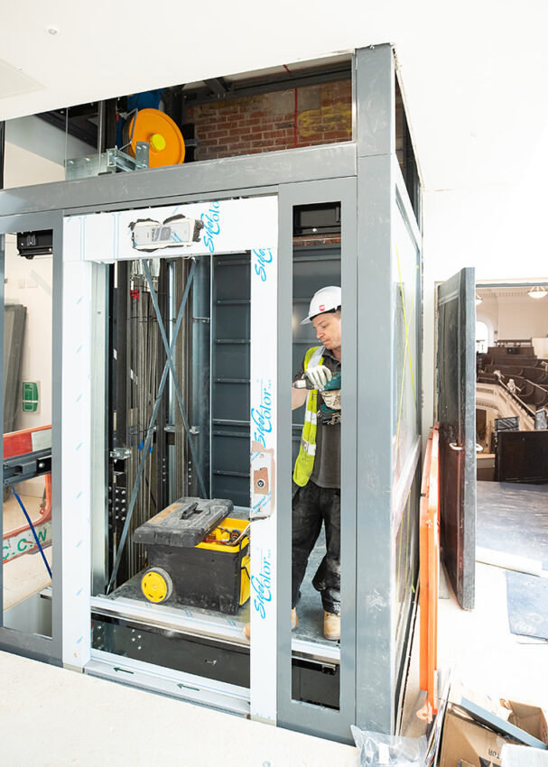 Glass Lift Installation Nottingham Trent University, University Hall, lift engineer at work