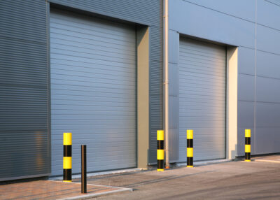 Detail of steel roller-shutter doors on a new industrial unit